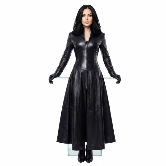 Front view of a woman wearing a floor-length pure black leather Matrix trench coat with a zipped front and high collar.