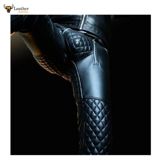 Close-up of a man's black cowhide leather pants featuring a quilted design on the knee area and a visible brand tag.