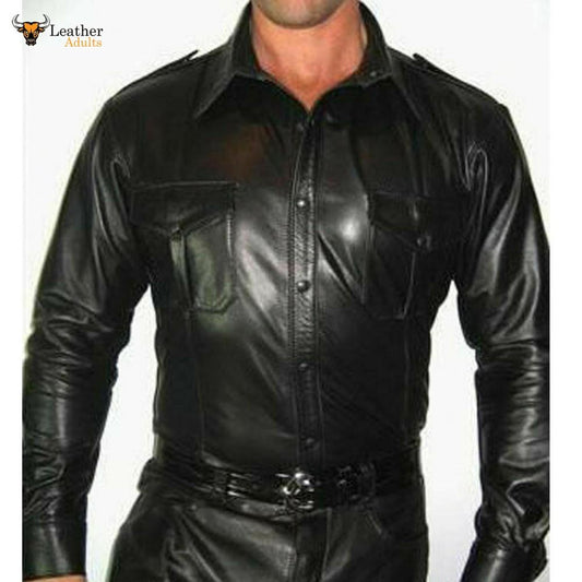 A man wearing a black leather police-style shirt with long sleeves and breast pockets, featuring a satin finish and sheep leather press stud fastenings.