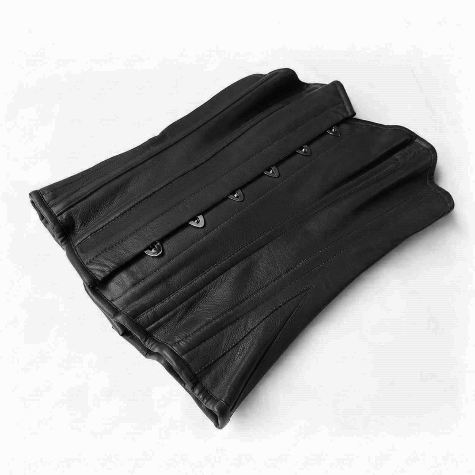 Flat lay view showcasing the smooth grain texture of the black sheepskin leather overbust corset folded flat.