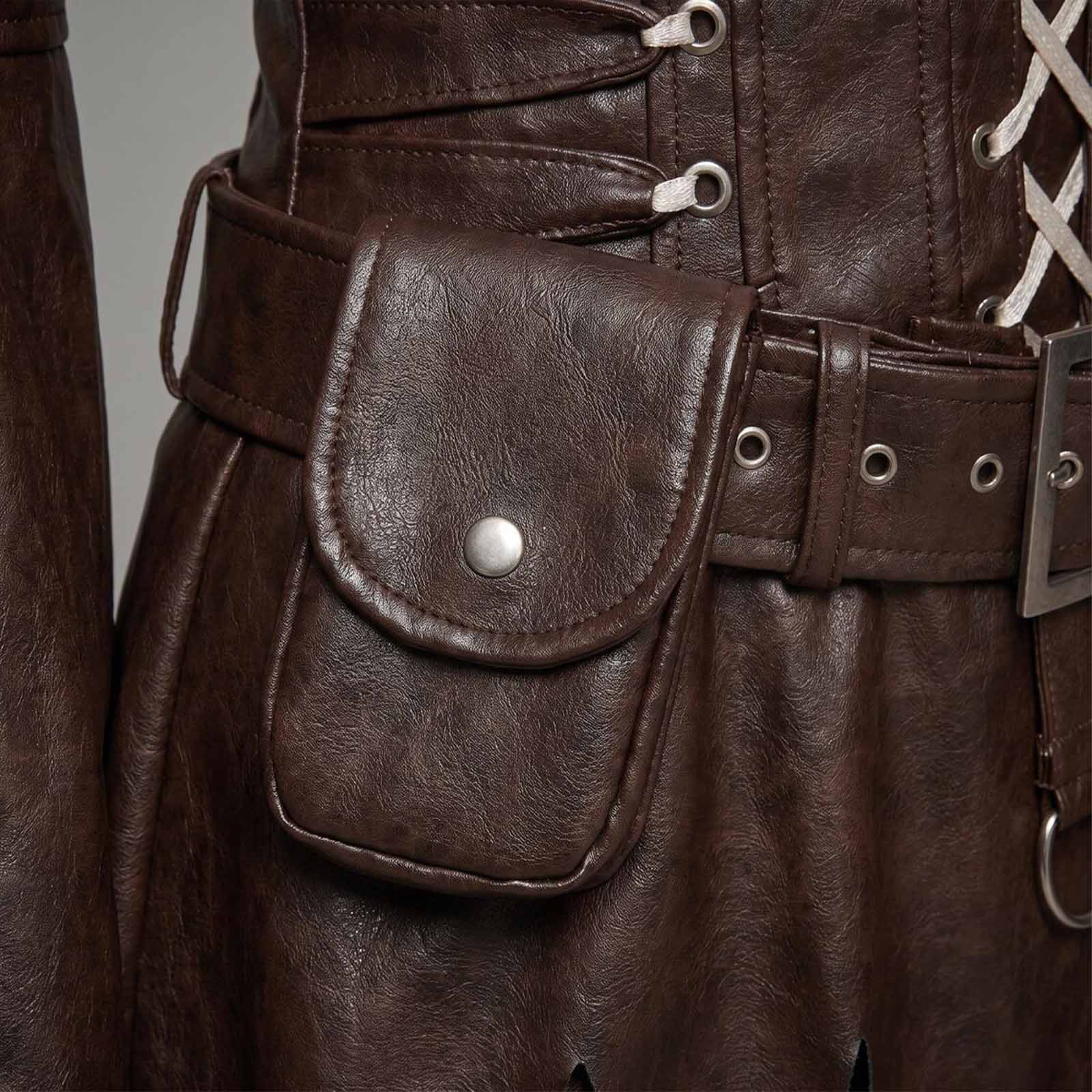 Close-up of a dark brown lambskin leather or leather belt pouch with a silver snap button, attached to a matching belt with metal eyelets, on a dark brown laced garment.