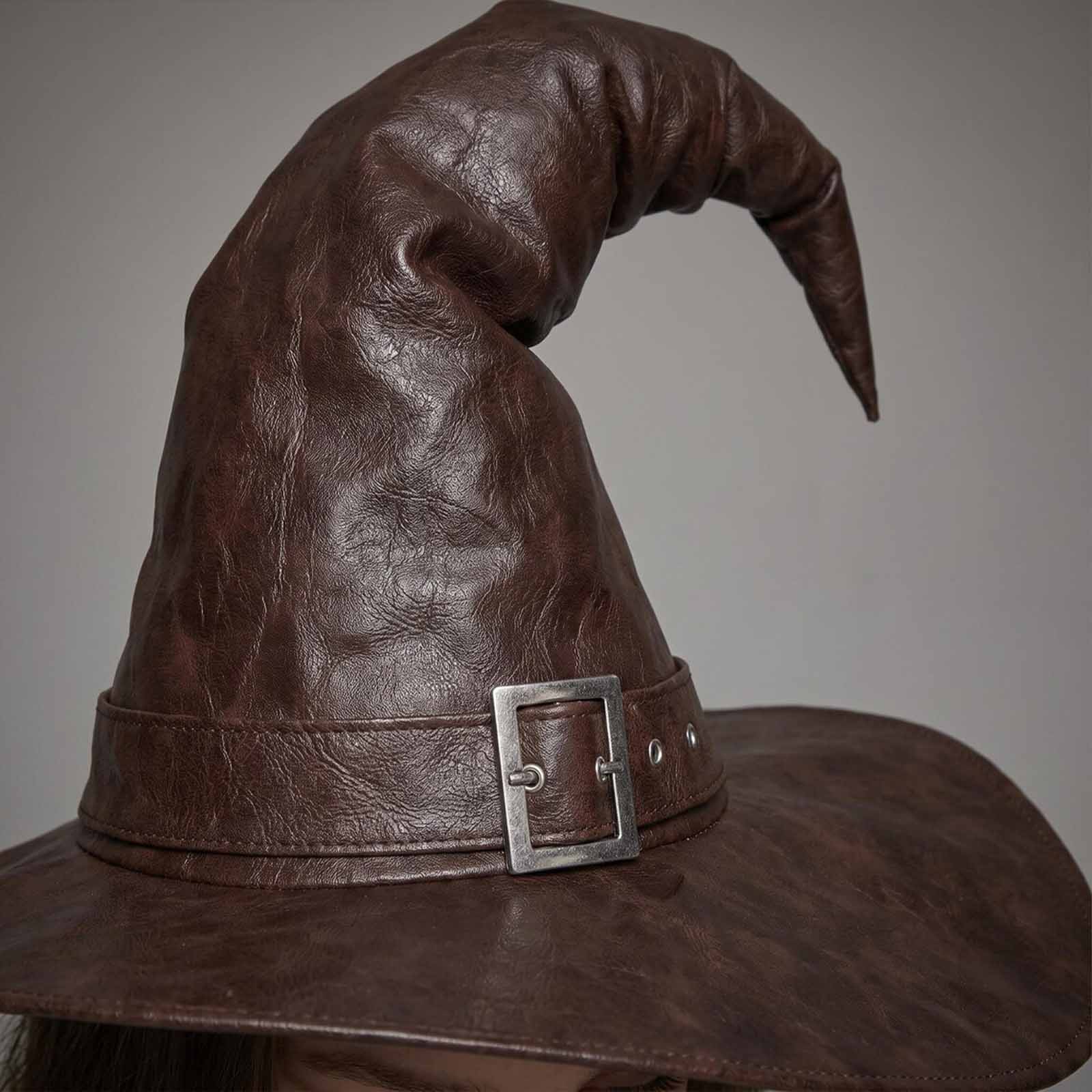 A dark brown lambskin leather witch hat with a wide brim and a silver buckle, shown close-up against a neutral gray background.