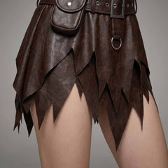 Detailed shot of the hand cut multi layered jagged skirt points crafted from women's real brown lambskin leather.