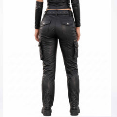 Back view highlighting the rear snap flap pockets, straight leg cut, and belt detail of women's black leather riding pants.