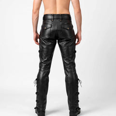Direct rear close up of black leather gothic pants displaying wide belt loops, dual snap pockets, and knee seams