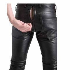 Close up view of hands unzipping the two way rear zipper on mens black cowhide leather trousers