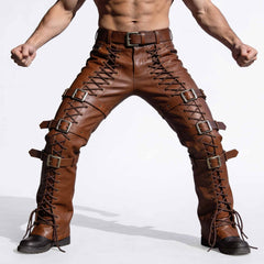Full front action pose of muscular man wearing handmade brown cowhide leather pants with front leg cord lacing and horizontal buckle straps