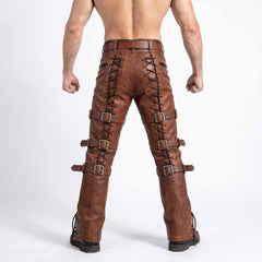 Direct rear view of man showing fit of brown cowhide leather pants with rear spine cord lacing and five pocket waist styling
