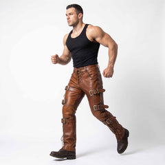 Profile running stance of man wearing brown genuine leather warrior pants showcasing boot stacking and side buckle hardware