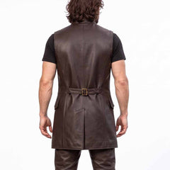 Rear upper torso view of man wearing brown leather medieval vest showing back waist strap and clean vertical seams
