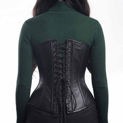 Back view showing the silver metal eyelets and black lace-up cinching cords on a matte leather overbust corset top.