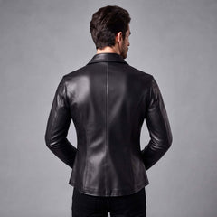 Rear view showing the tailored back panel seams and structured fit of a men's black handcrafted real leather shirt.