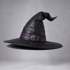 Studio shot of the handmade black leather witch hat accented with a purple band and metal buckle.