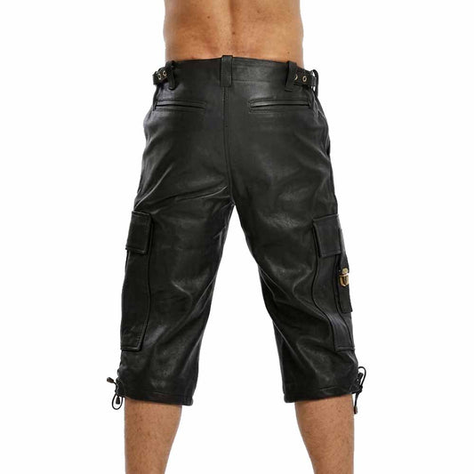 Rear perspective of men's long-leg leather cargo shorts showing rear welt pockets, side waist adjustment buckle tabs, and below-the-knee hem drawstrings.