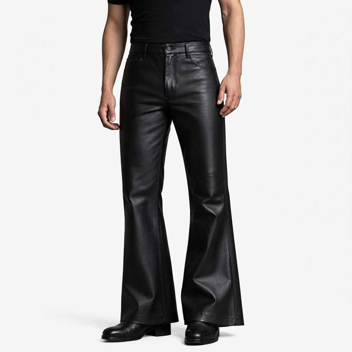 Front view of a man wearing black genuine lambskin leather bell bottom pants with a high waist and wide flared hem.
