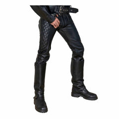 Front three-quarter view of man wearing black cowhide leather biker saddle pants with diamond quilted thigh padding tucked into tall riding boots.