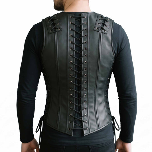 Direct back view of male model wearing black cowhide leather corset vest showing full length spine cord lacing and vertical boning channels