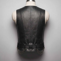 Back view of tailored men's black leather gothic waistcoat showing vertical panel stitching, wide belt loops, and draped curb chains.