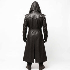 Back view of man wearing tailored black leather trench coat displaying pointed inverted V storm flap yoke, waist belt, and tall center walking vent