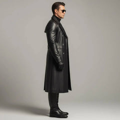 Rear full body view of mens black cowhide leather duster coat showing upper storm flap waist belt and center split walking vent