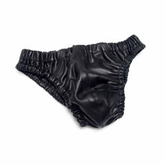 Flat lay of men's genuine black leather briefs showing soft gathered leg openings and stitching
