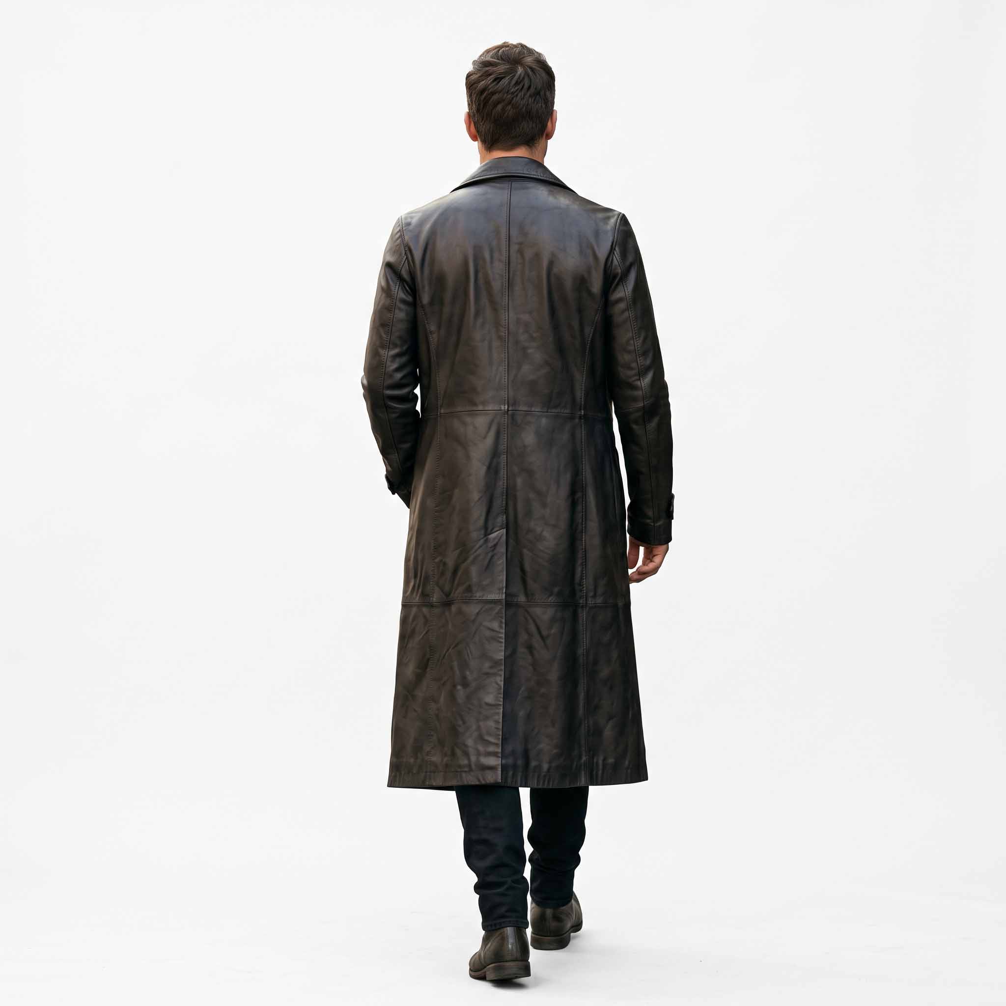 Back full length studio view of mens black genuine leather duster coat showing tailored vertical back seams and center split walking vent