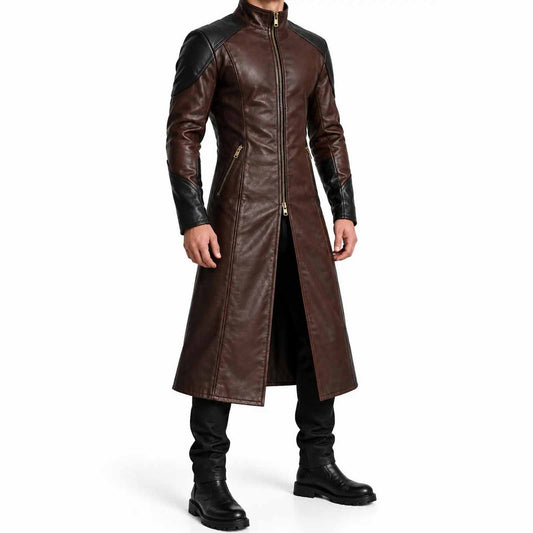 Three quarter perspective of man modeling long brown leather duster with black shoulder panels and side zipper pockets
