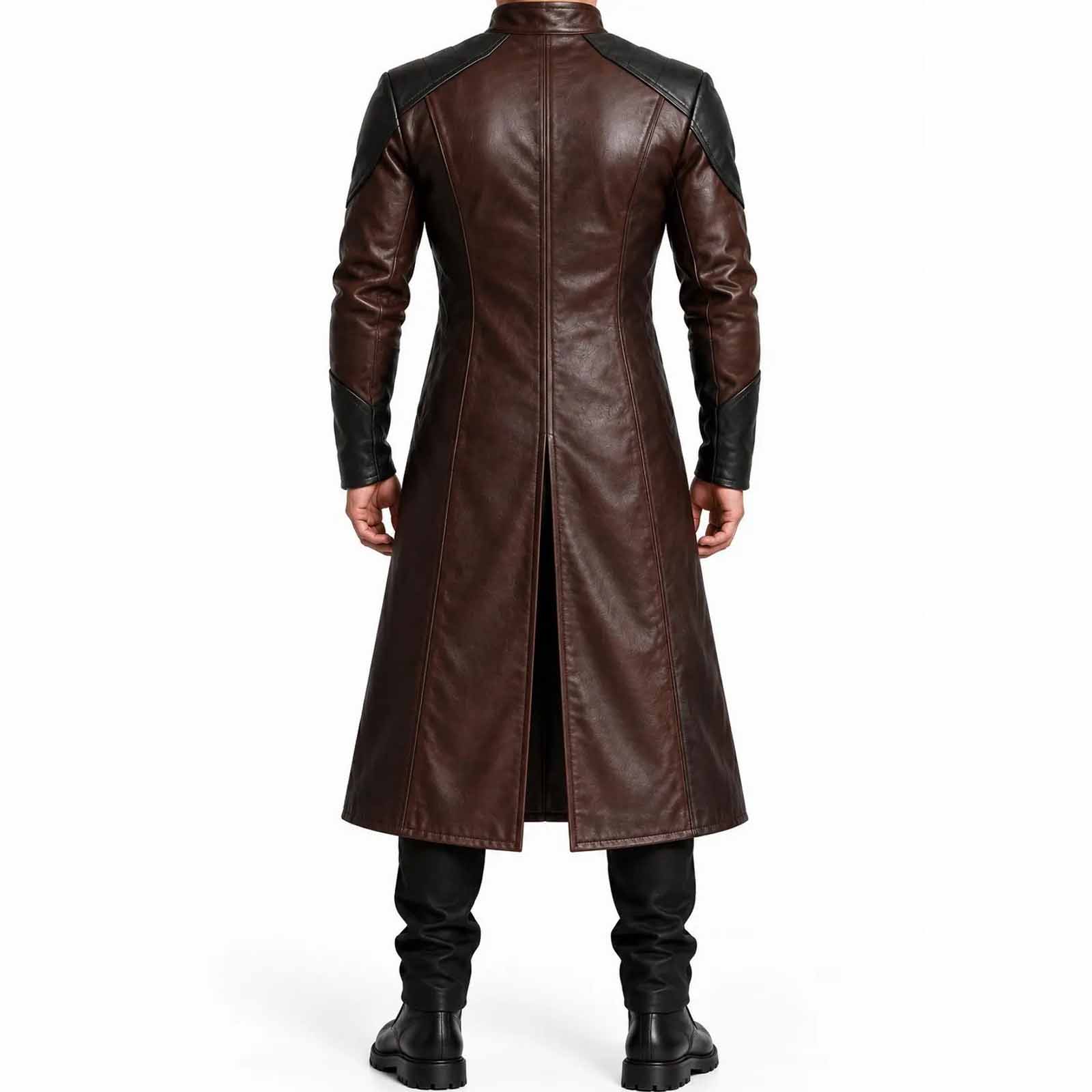 Back view of man wearing two tone brown leather duster coat showing black shoulder yoke and deep center split walking vent