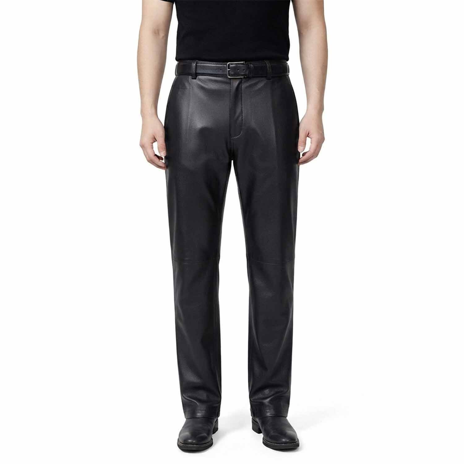 Full-length front view of a man wearing classic-fit blsck leather formal trousers with a smooth finish and straight leg.
