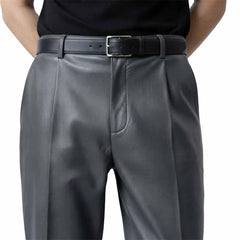 Close-up front view of men's genuine gray lambskin leather formal pants featuring pleated front detailing and a classic leather belt.