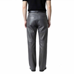 Rear view of men's gray leather formal trousers highlighting tailored back pockets and a sharp, polished silhouette.
