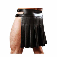 Black leather kilt skirt with pleated design and side cutouts, shown on a model against a white background.
