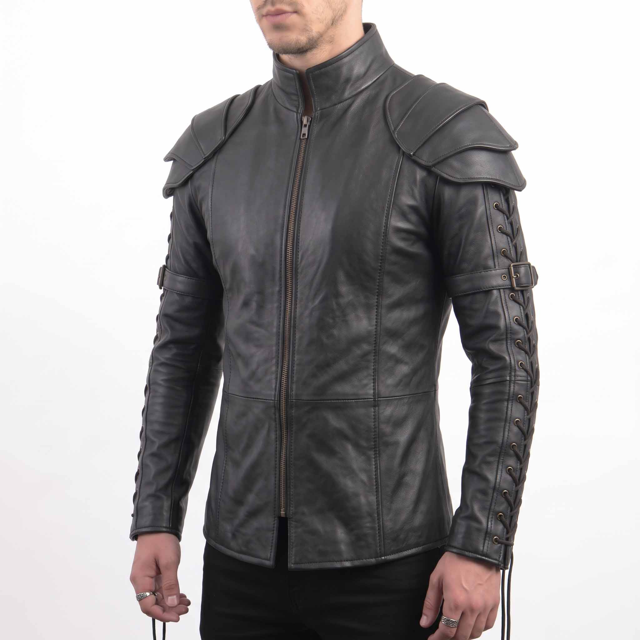 Front three-quarter view of man wearing tailored black leather larp shirt highlighting front metal zipper and structured leather shoulder pauldrons