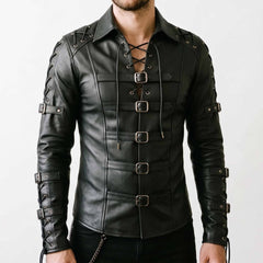 Front view of male model wearing handmade gothic black cowhide leather shirt with chest cord lacing, fold down collar, and five horizontal roller buckles