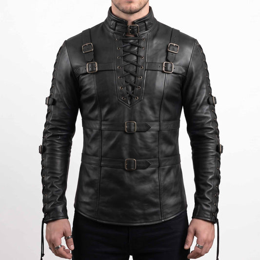Front torso view of man wearing handmade gothic black leather shirt with center bib cord lacing, chest buckles, and buckled mandarin collar