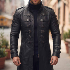 Close up view of man wearing black leather gothic military overcoat highlighting front roller buckle straps and shoulder epaulettes on city sidewalk