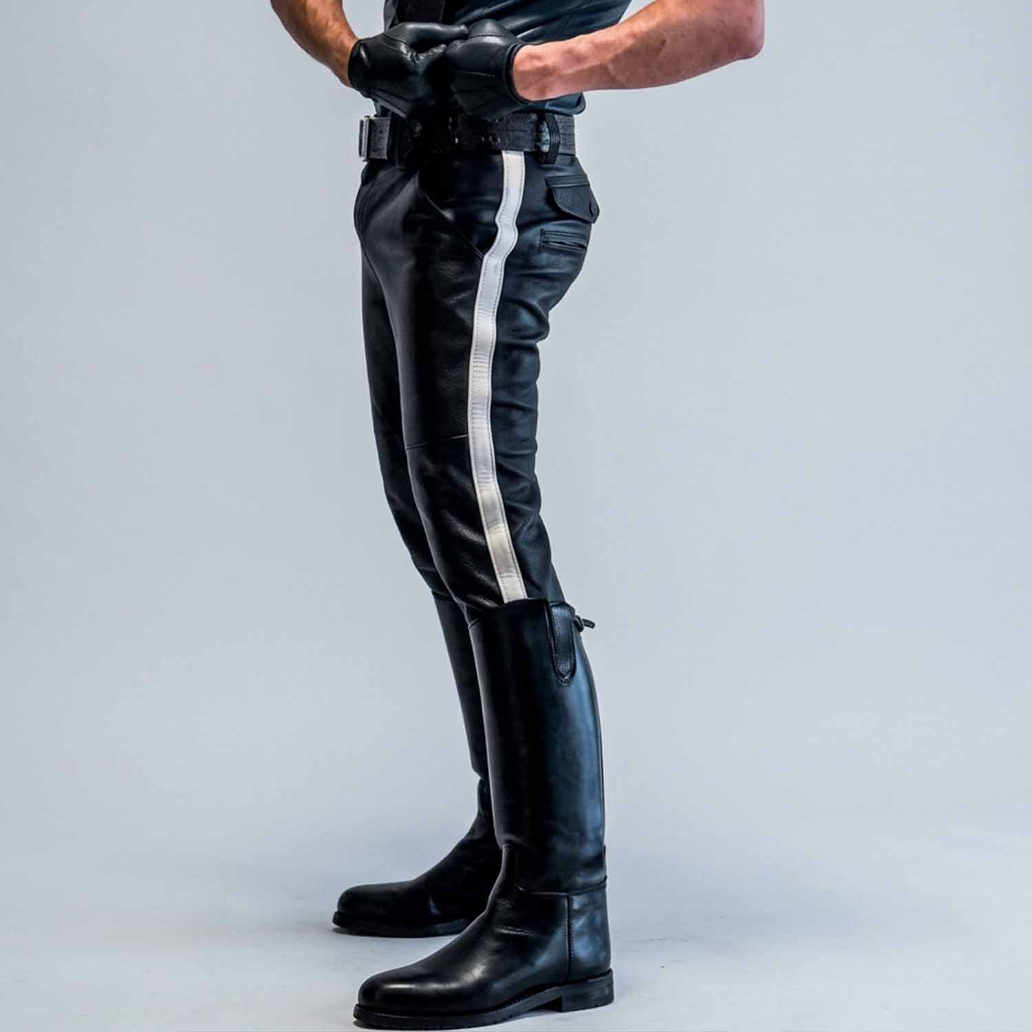 Side profile view highlighting the slim tapered leg, mid-rise fit, and striking vertical white stripe detail of the leather breeches.