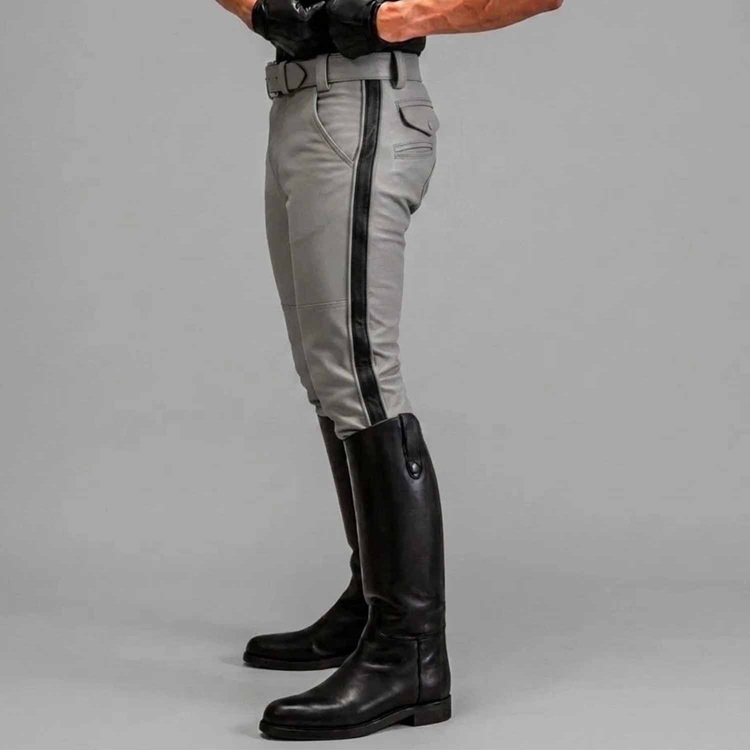 Side profile view highlighting the slim tapered leg, mid-rise fit, and striking vertical white stripe detail of the leather breeches.