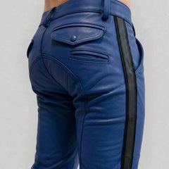 Close-up rear view of a man wearing royal blue cowhide leather breeches with a crisp black side stripe, featuring buttoned rear flap pockets and custom paneling.