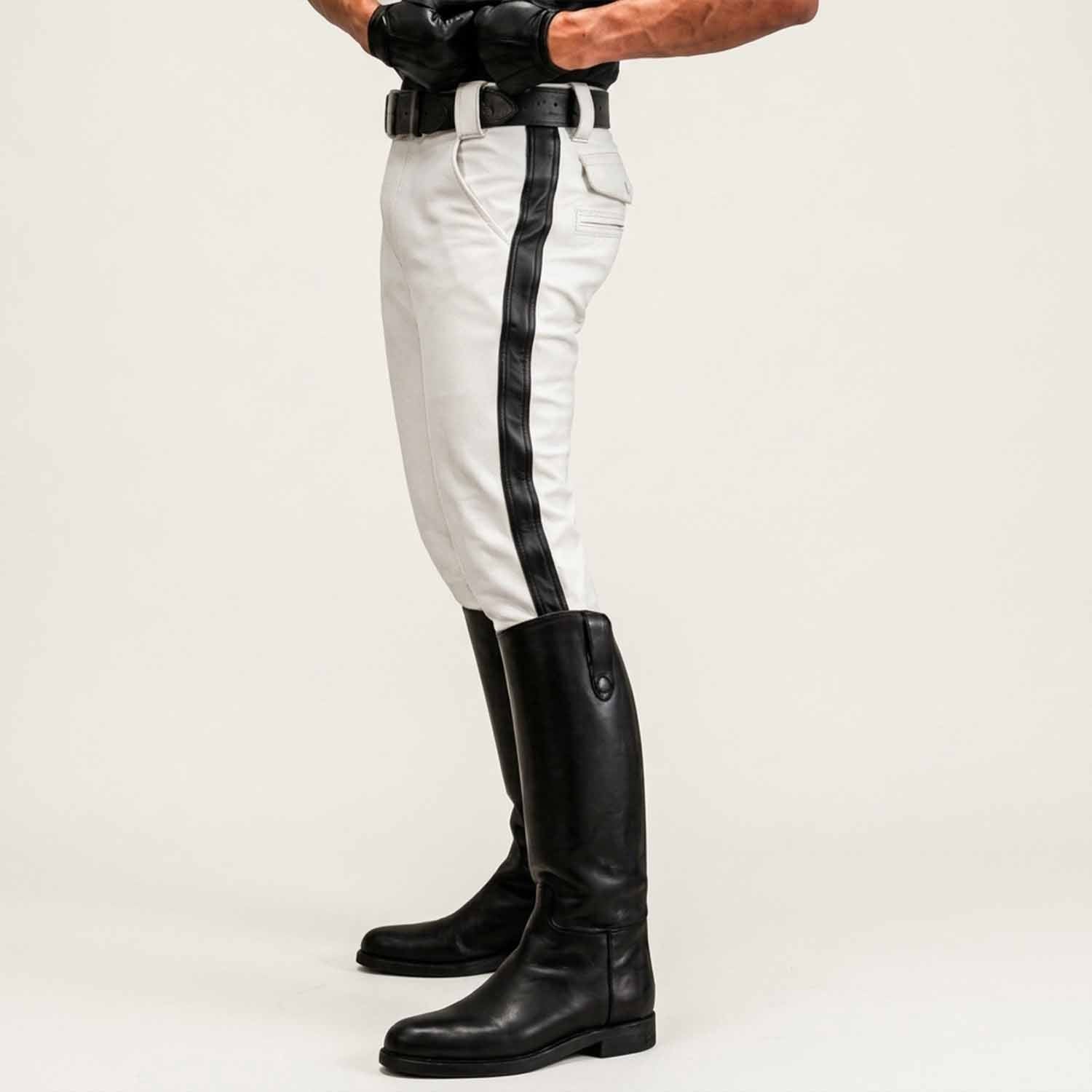 Side profile view highlighting the slim tapered leg, mid-rise fit, and striking vertical white stripe detail of the leather breeches.