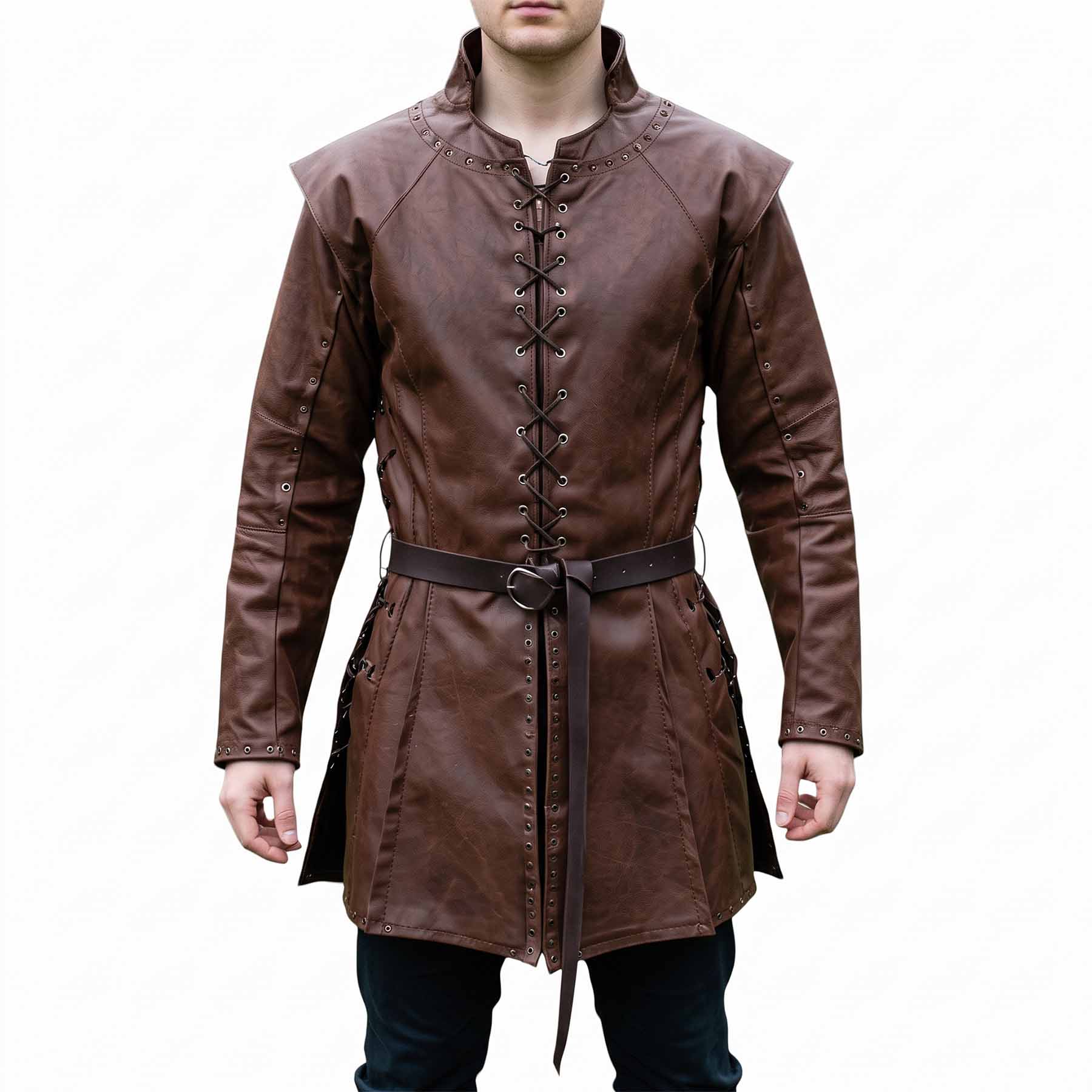 Front view of a man modeling the handmade brown leather medieval tunic shirt with lace-up chest, shoulder cap overlays, and matching buckled waist belt (pants not included).
