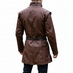 Rear view of the men's brown leather warrior tunic displaying clean vertical back panels, structured collar, and grommeted bottom hemline.