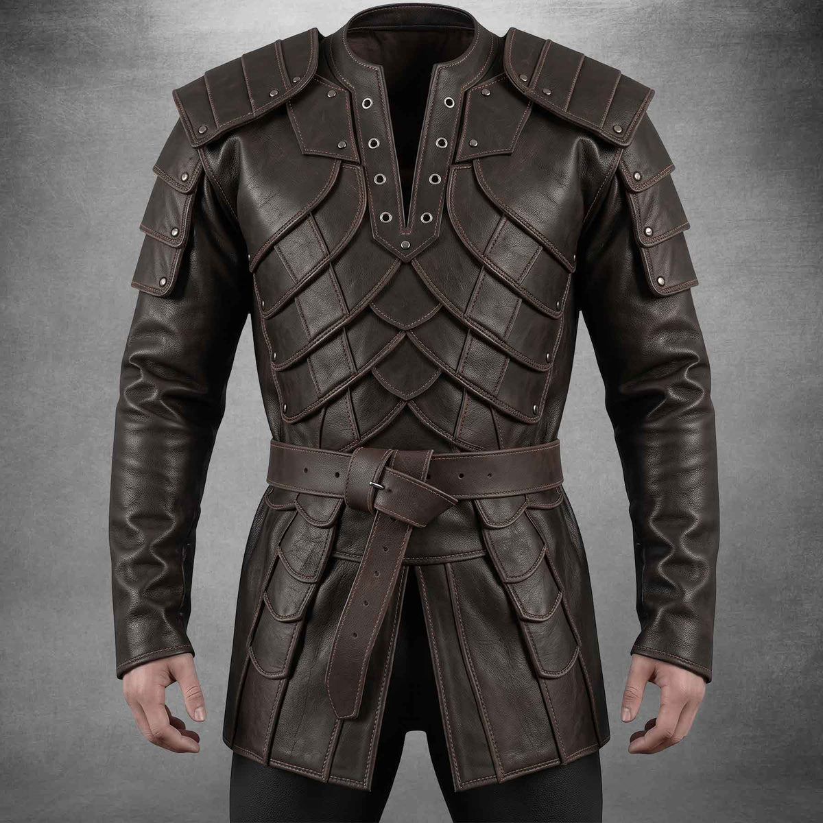 Front view of a men's dark brown leather medieval armor coat showcasing layered scale chest plates, riveted tiered shoulder pauldrons, and a matching buckle waist belt.