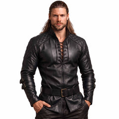Front studio portrait of muscular man wearing handmade black cowhide leather quilted viking shirt with center chest cord ties and waist belt
