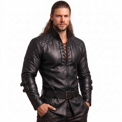 Front three-quarter view of man posing in black genuine leather fantasy warrior shirt showcasing quilted shoulders and forearm buckles