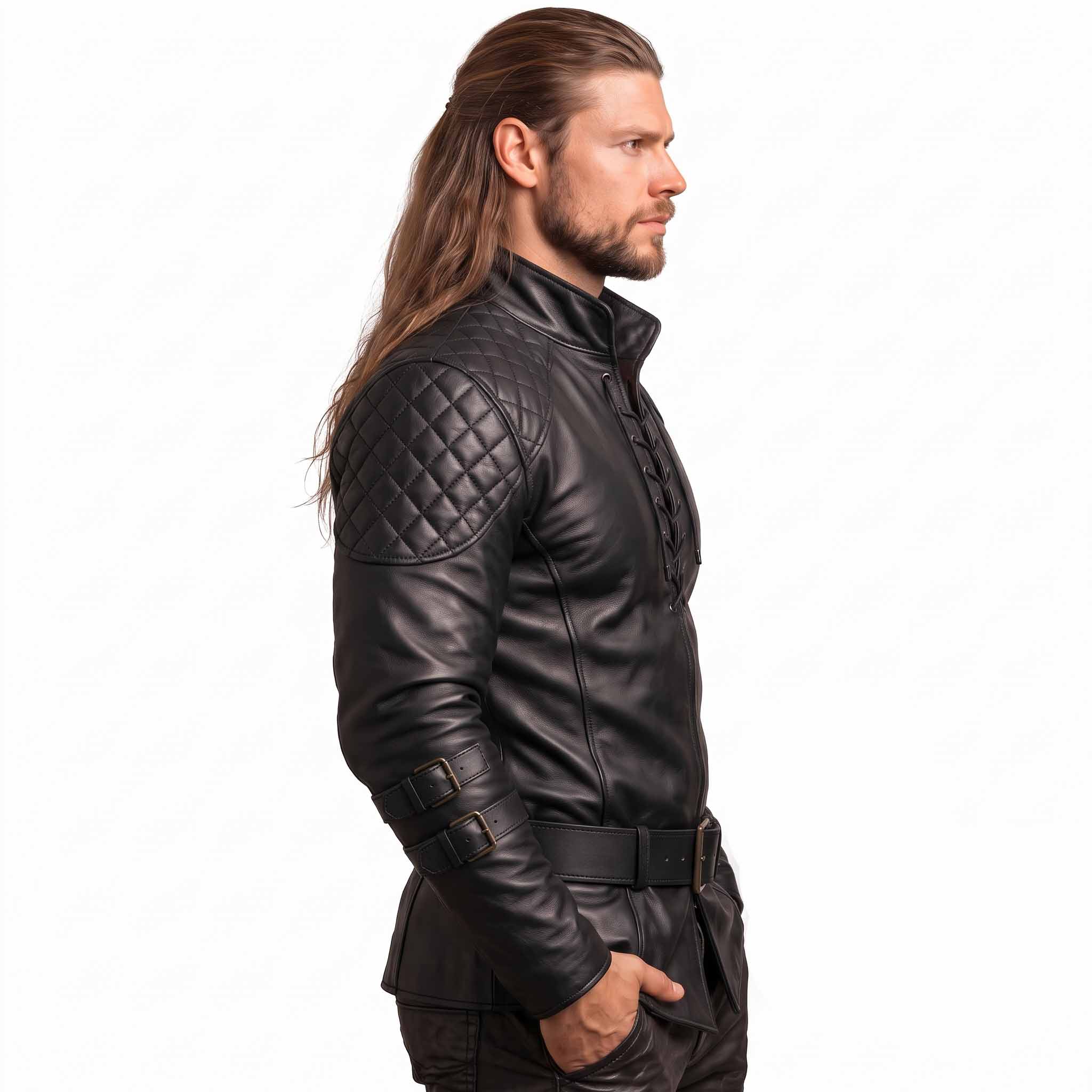 Side profile view of male model wearing black leather renaissance tunic detailing diamond padded shoulder armor and high stand collar