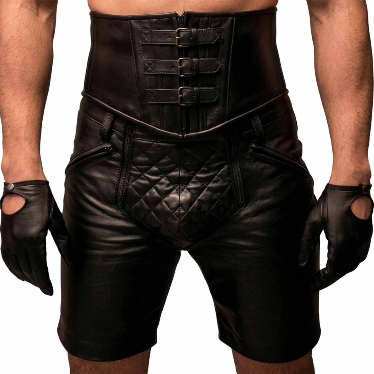 Front view of men's black real cow leather clubwear shorts showcasing high buckled corset waistband, diamond quilted crotch panel, and zipped pockets.