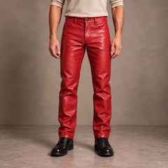 Full-length front view of man wearing tailored royal red cowhide leather slim bootcut pants with black dress boots