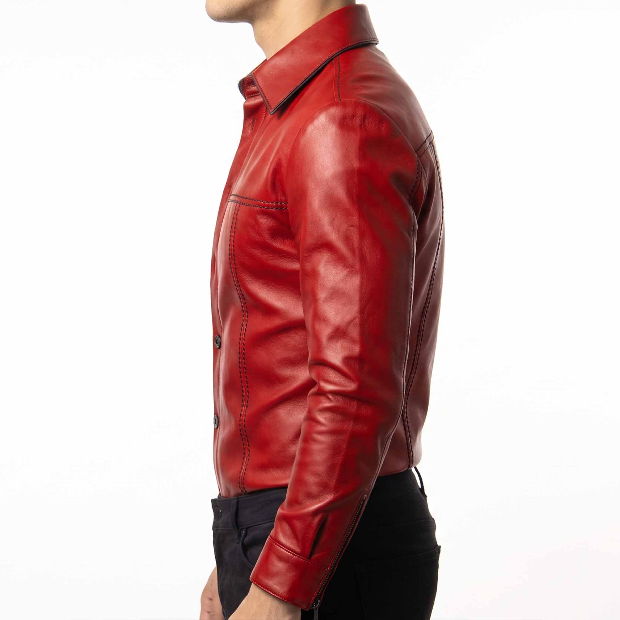 Side profile 90 degree studio view of fitted red leather shirt showing structured sleeve seams and zipper cuff detail