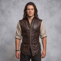 Front studio portrait of man modeling distressed brown sheepskin leather doublet vest with antique metal shank buttons